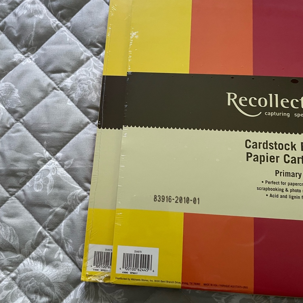 Huge set of scrapbook paper in various colors & prints.